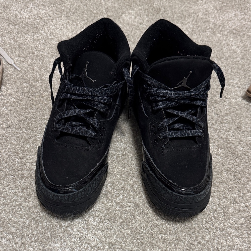Nike Black Low-Top Jordan Sneakers with Textured Accents